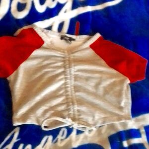 Girls grey crop top. Multi color. Grey and red, tie down the middle. Ties.